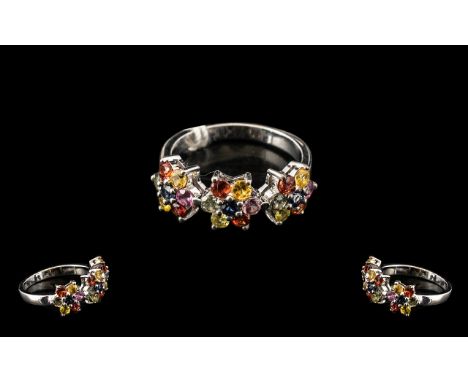 Rainbow Sapphire Floral Cluster Trilogy Ring, each flower set with green, golden yellow, citrus yellow, orange, sunset orange