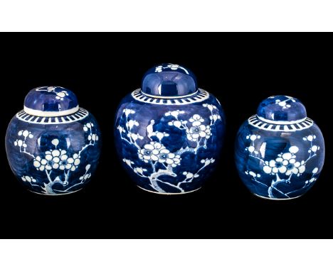 Three Blue And White Chinese Ginger Jars With Covers. Of Typical Form, Decorated Allover With Blooming Prunus Branches. Doubl