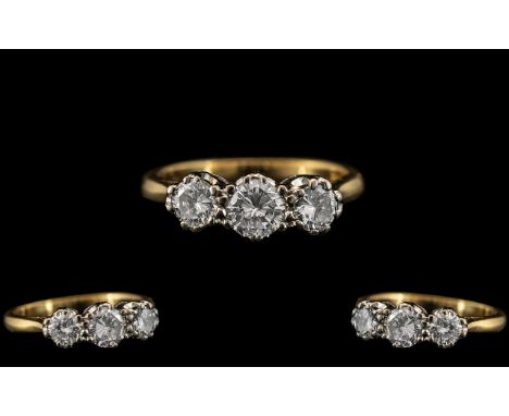 18ct Gold and Platinum - Attractive 3 Stone Diamond Set Ring In a Gallery Setting. The 3 Round Brilliant Cut Diamonds of Exce