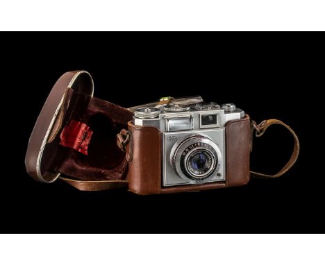 Camera Zeiss-Ikon Cortina Novicar-Anastigmat 1-28 F.45mm Prontor-SUS.  In brown leather case, 1244.24.