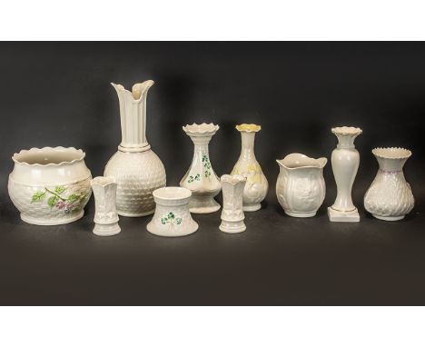 Collection of Belleek Irish Porcelain, comprising a large pot planter, an 11" long neck vase, a 7" two piece pot, a pair of 4