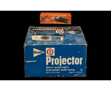 Camera Interest - Boots IQ Projector. A Boxed Boots IQ Projector. Together With A Boots Slide Magazine. Please See Accompanyi