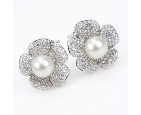 Approx. 7.50 Carat Pave Set Diamond, South Sea Pearl and 18 Karat White Gold Flower Earrings. Pearls measure 11mm. Diamond G-