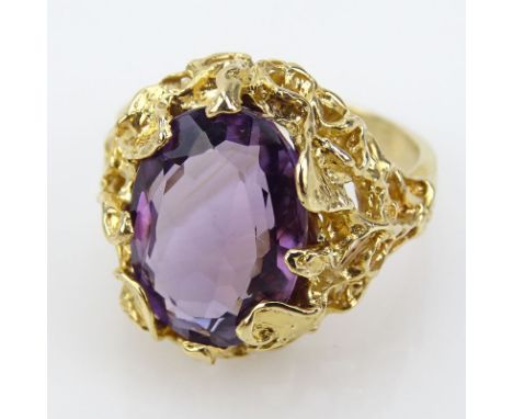 Lady's Vintage Oval Cut Amethyst and 14 Karat Yellow Gold Ring. Stamped 14K. Good condition. Ring size 9-1/2. Approx. weight: