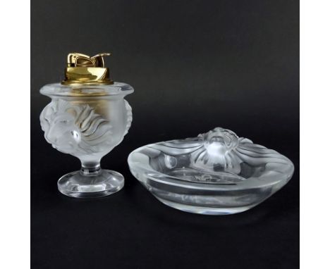 Two (2) Piece Lalique "Tete De Lion" Crystal Smoking Set. Includes lighter and ashtray. Signed. Good condition. Lighter measu