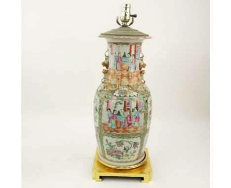 Late 19th or Early 20th Century Chinese Rose Medallion Porcelain Vase Mounted as Lamp. Enamel painted panels of courtyard sce