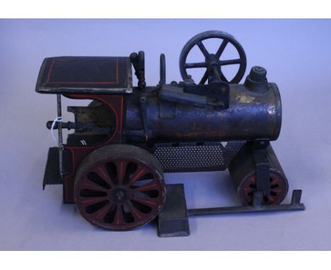 Bing steam roller "Pluto" with an oscillating cylinder with an interesting reversing lever. It has the perforated flame guard