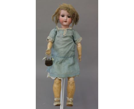 Late 19th/early 20th century Armand Marseille (Germany) '390' bisque head doll, having tall composition jointed body, brown e