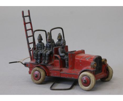 Johillco Fire Engine with five seated fireman figures and ladder, length 9 cm. F, paint very worn, missing bell, original tyr