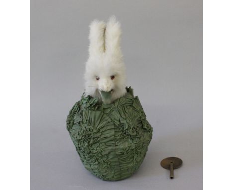 Roullet et Decamps rabbit in cabbage automaton, white fur covered rabbit rises from centre of cabbage, ears raise and mouth c