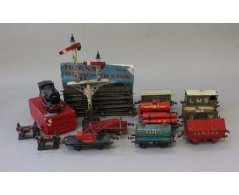 Hornby O Gauge No. 40 C/Work reversing 0-4-0 tank engine. No.82011 B.R Black. G in G box . Together with 8 x assorted rolling