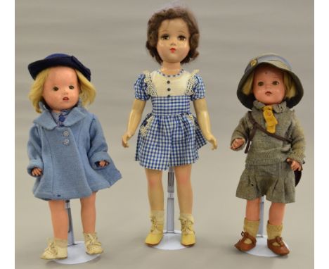 Three composition dolls: Aranbee (America) doll, c.1930's/40's, with sleeping brown eyes, painted features, brown wig, height