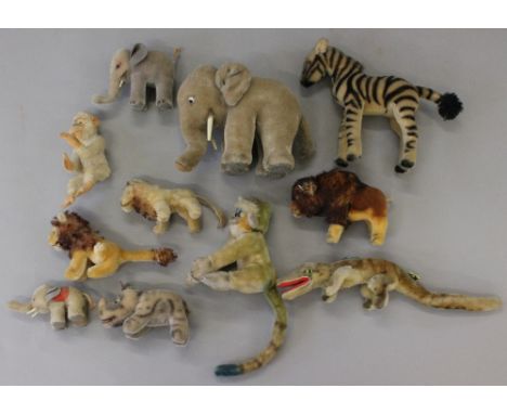 Selection of Steiff animals, includes: Zebra, h.20cm; Rhino, h.8cm; Lion, h.10cm; 3 x elephants, h.6.5, 9.5 and 17cm; Gaty, w