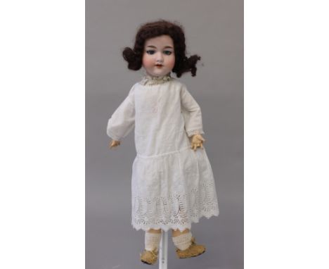 Late 19th/early 20th century Armand Marseille (Germany) '390' bisque head doll, having slim composition jointed body, blue ey