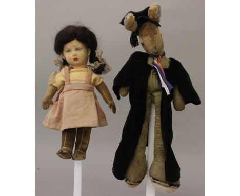 Chad Valley cloth doll, with pressed felt face, painted features, brown wig, velveteen arms and legs, labels to feet, height 
