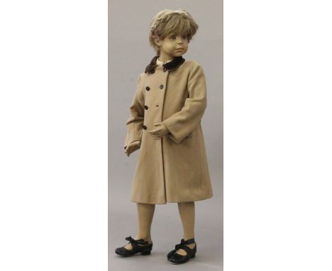 Female child mannequin, standing, height 106 cm, green eyes, closed mouth, short blonde wig with plait, detachable limbs, wea