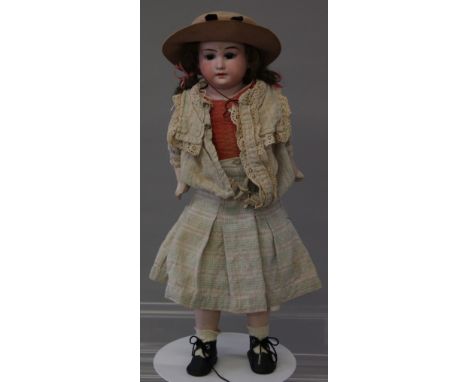 Armand Marseille/ Cuno & Otto Dressel (Germany) bisque shoulder head doll, having pink linen body and bisque forearms and leg
