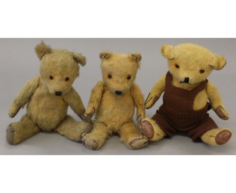 Three 1950's teddy bears by Chad Valley and other, with stitched noses, mouths and claws. Heights between 38-40cm. Well-loved