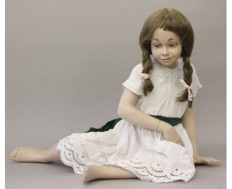 Female child mannequin, sitting, height 62 cm, blue eyes, painted eyebrows, open mouth, detachable limbs, brown wig with frin