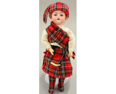 Late 19th/early 20th century bisque head doll, faintly impressed '192', possibly Gebruder Knoch, with blue eyes, open mouth w
