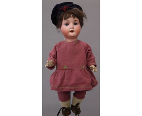 Late 19th/early 20th century bisque head composition body doll, possibly Recknagel (Germany), head impressed ' 24 Germany R0A