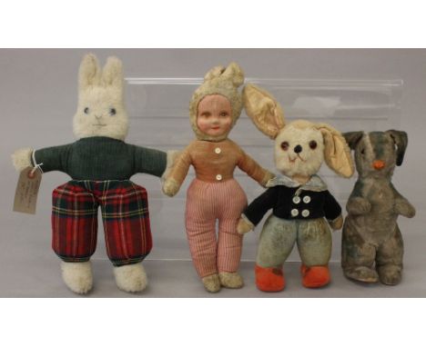 Four rabbit soft toys: Maruei Industrial Co. (Japan) straw stuffed mohair rabbit c.1930s with glass eyes, printed pads to fee