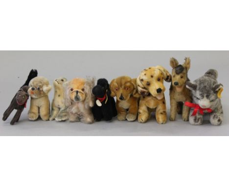 Quantity of Steiff plush toys: Blacky Poodle, button and tag to ear and label to chest, length 12 cm; Scary Cat, height 15 cm