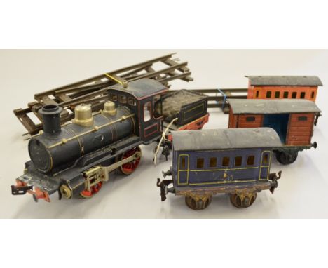 Marklin Gauge 1 tinplate clockwork 0-4-0 locomotive & tender, Circa 1895. Dark green & black livery (crazed paintwork) with b