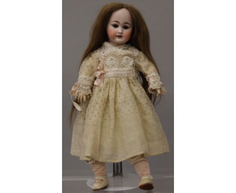 Late 19th/early 20th century bisque head doll, impressed 'S 1008', possibly Simon & Halbig, having jointed composition body, 