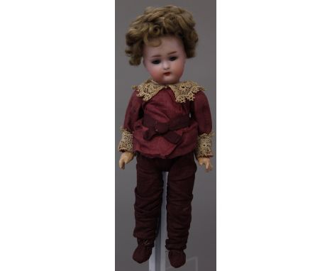 Kammer & Reinhardt /Simon Halbig (Germany) bisque head composition body doll, impressed 'K*R 23', having fixed blue eyes, ope