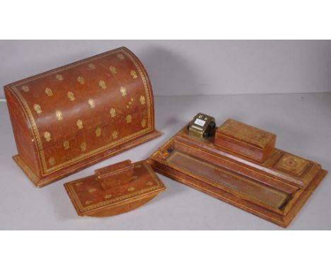 Three piece leather covered desk set including standish, with date and covered box, lidded stationery box and blotting paper 
