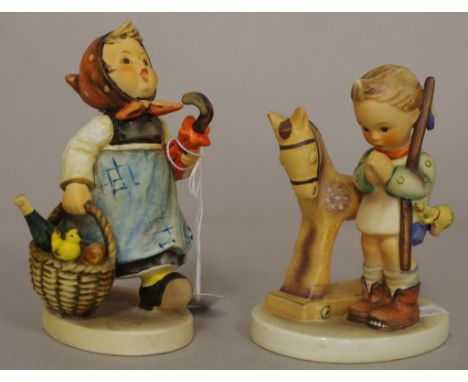 Two various Goebel ceramic figures boy with rocking horse; and girl with picnic basket. Height 12cm approx (each).