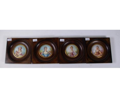 Set four framed & signed portrait miniatures each of a woman in classical dress. In matching wood frames. Diameter 6cm approx