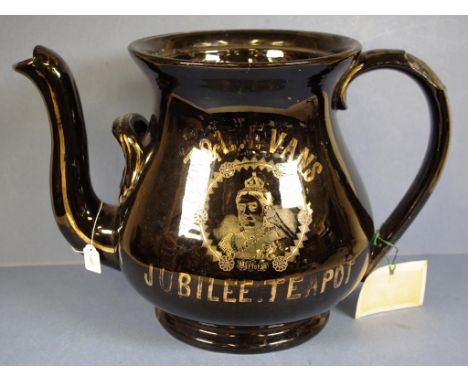 Victorian commemorative Barge teapot marked to body with "T & L. Evans- Jubilee" with gilded portrait of Queen Victoria, on b