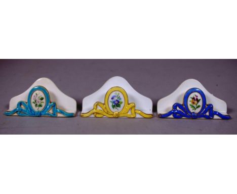 Set three vintage porcelain menu holders each floral decorated, marked to bases "John Mortlock, London." Width 9cm approx (ea