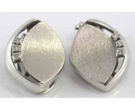 14ct white gold & diamond clip earrings Weight: approx 7.09 grams