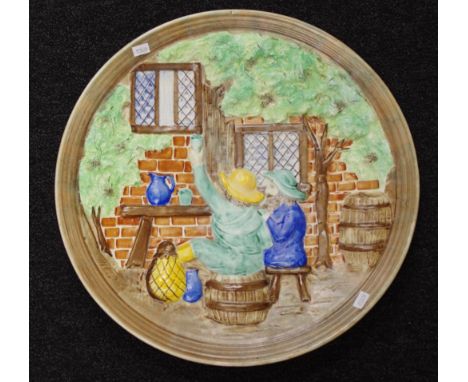 Vintage HJ Wood wall charger seated figures decorated in relief. Diameter 41cm approx.