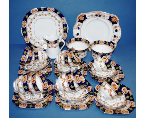 Vintage English china tea service St Michael, comprising 10 trios, creamer, 2 sugar bowls & 2 cake plates, as inspected