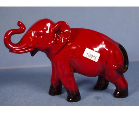Royal Doulton Flambe elephant  figurine with trunk up, initialed FM to foot, height 11.5cm approx