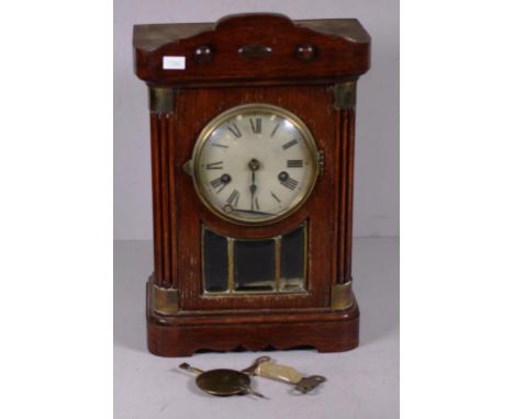 Vintage wood cased mantle clock faceted glass to front, key and pendulum available, needs service. Movement marked H/P18. Hei