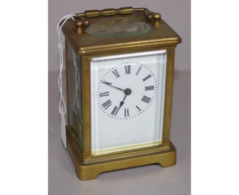 French brass cased carriage clock Roan numerals to white enamel dial (as inspected). Untested, and may need service. Height 1