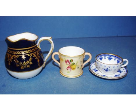 Royal Worcester miniature blush ivory loving cup together with a miniature Spode creamer, cup and saucer (as inspected)