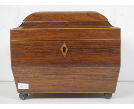 William IV rosewood sarcophagus caddy with boxwood stringing, brass fittings and twin lidded interior, circa 1830, 21cm wide,