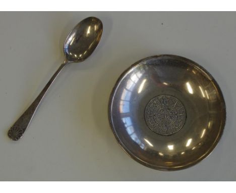 Sterling silver coin dish and teaspoon the Mexican dish 10.7cm diameter and the spoon hallmarked Sheffield 1897, 62 grams tot