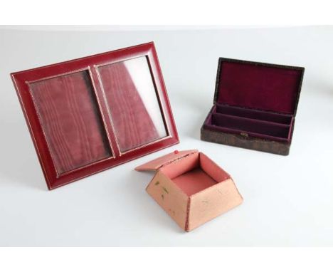 A small crocodile skin trinket box; together with a double red leather picture frame and a small painted pink silk trinket bo