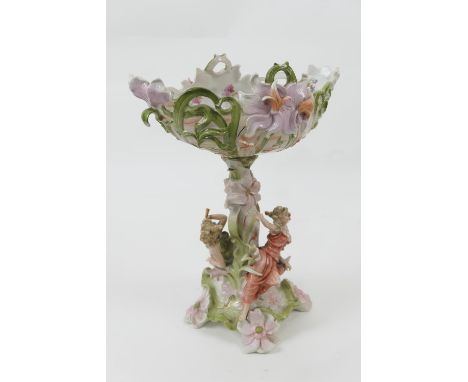 Sitzendorf porcelain pedestal fruit bowl, heavily moulded with Art Nouveau inspired flowers and foliage, the pedestal with tw