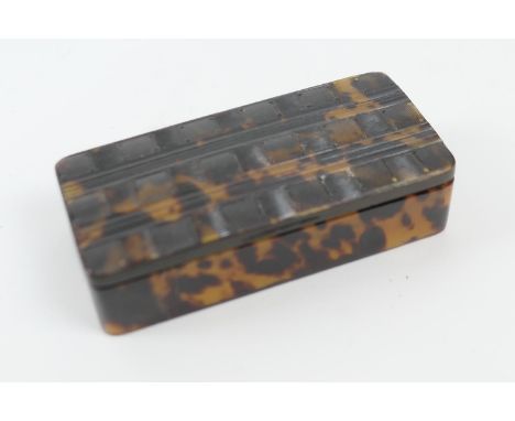 Tortoiseshell snuff box, early 19th Century, rectangular form, the cover pressed with chequerboard and horizontal linear deco