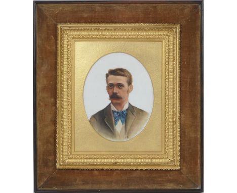 Late Victorian School, Portrait of a gentleman in a blue cravat, oil on milk glass panel, oval, signed with initials 'BB' and