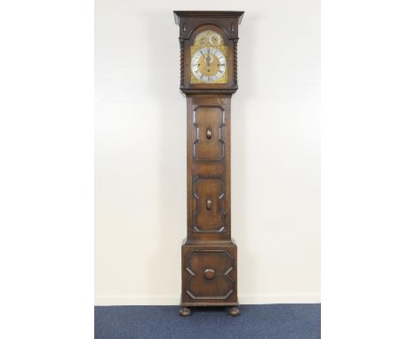 George V oak musical chiming eight day longcase clock, by Russells Ltd, Liverpool, the hood with barleytwist columns flanking