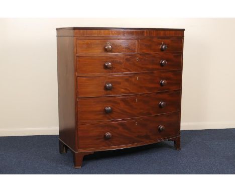 Mahogany bowfront chest of drawers, 19th Century, fitted with two short and four long graduating drawers with turned wooden k